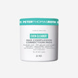 White cylindrical jar with teal band containing 60 complexion correction pads by Peter Thomas Roth.