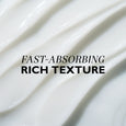 Creamy white moisturizer with smooth, swirled texture displayed on light background.
