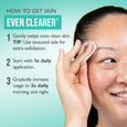 Person applying white textured pad to cheek with instructional text on turquoise background.