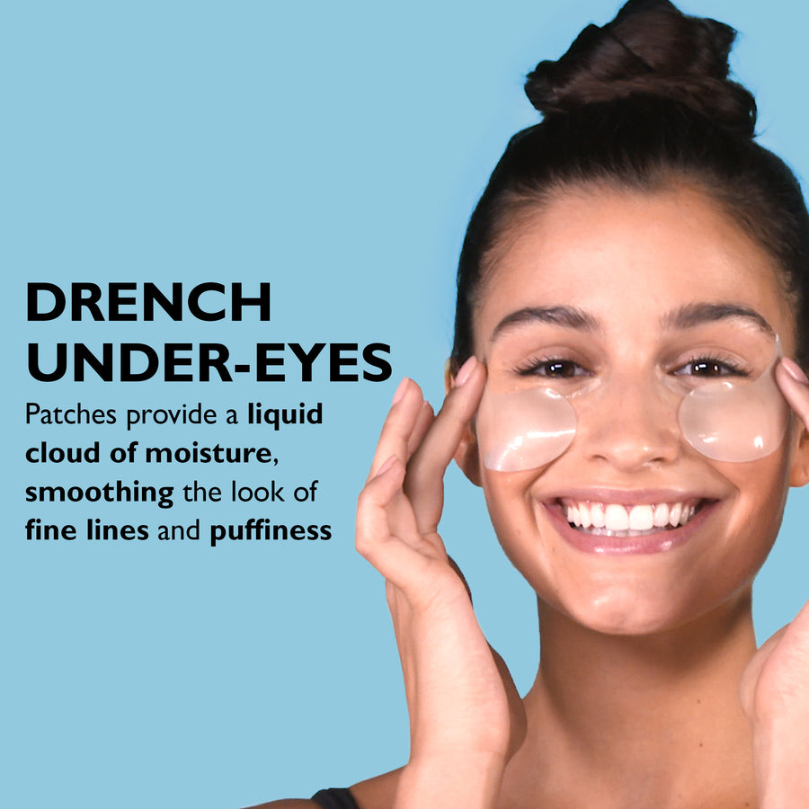 Person wearing clear gel eye patches under both eyes against a light blue background.
