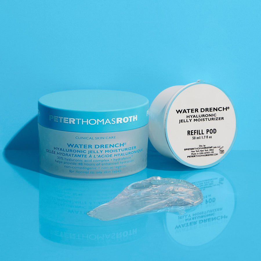 Transparent gel moisturizer swatch displayed next to turquoise jar and white refill pod labeled Water Drench Hyaluronic Jelly