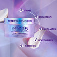Peter Thomas Roth Ultimate Solution 5 Multitasking Moisturizer jar with cream texture on purple background.