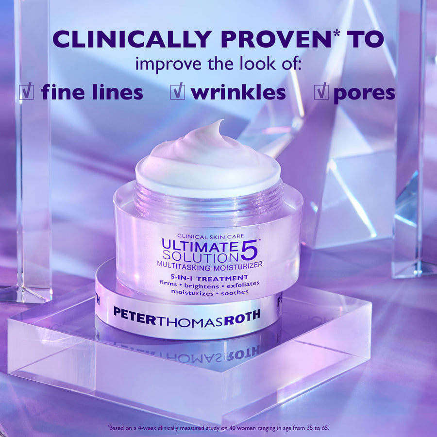 Purple-tinted jar of Ultimate Solution 5 Multitasking Moisturizer with white cream on top, displayed on translucent platform.