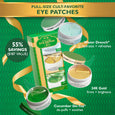 Three full-size eye patches in clear gel (green), gold, and cucumber varieties with packaging box on green patterned backgrou