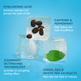 Three transparent ice cubes containing coffee beans, peppermint leaf, and tea extracts on a blue background.