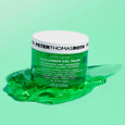 White jar with white lid containing green gel mask labeled "Cucumber Gel Mask Extreme De-Tox Hydrator" by Peter Thomas Roth, 