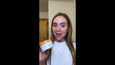 Jar of Potent-C Brightening Vitamin C Moisturizer with orange and white label held in hand.